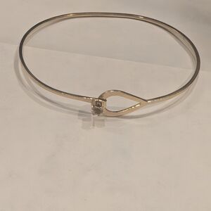 Avon Gold Tone Bypass Hinged Bracelet with Clear Stone